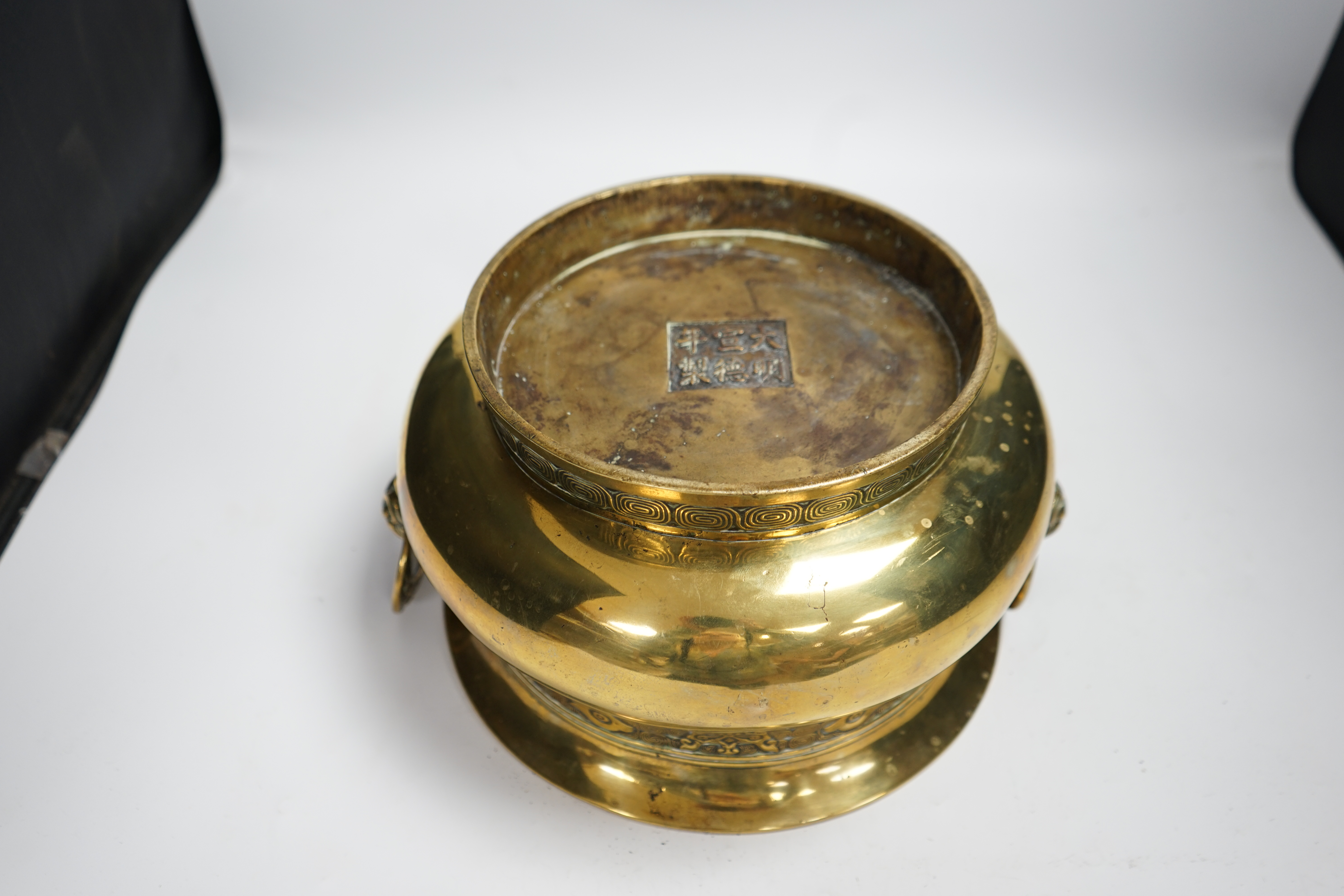 A large Chinese bronze censer, Xuande mark to base, 31cm across